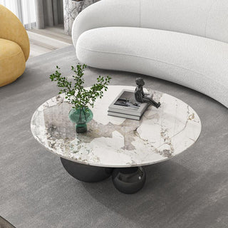 amalfi round stone coffee table living room setting