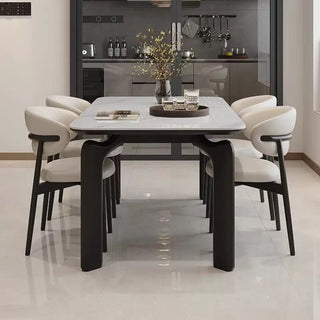 Dining table set with chairs in a modern kitchen