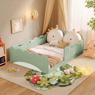 Children's room with a green bed, plush toys, and decorative elements.