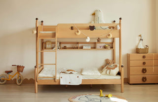 Wooden kids bunk bed with toys in a child's room